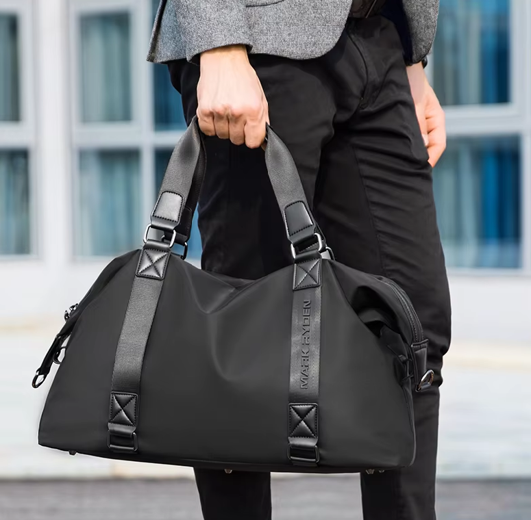 With a spacious 33-liter capacity, this bag effortlessly accommodates all your essentials, whether you’re heading to the gym, taking a weekend getaway, or embarking on an extended vacation.